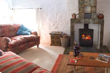The cosy wood-burner will keep your toes toasty on those cooler evenings.