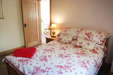 The delightful and spacious bedroom with en suite shower-room.