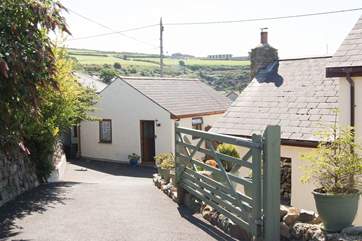 The Lilypad sits next to the Owners' house, Lily Cottage which has its own driveway and parking behind.