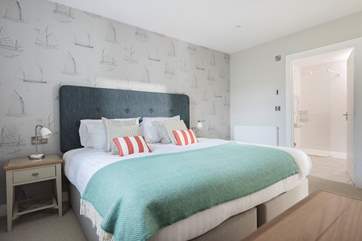 Bedroom 3 is also en suite and has a large walk-in shower next door.