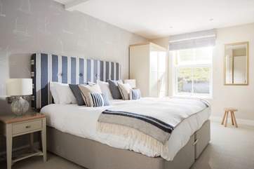 The master bedroom (Bedroom 2) is at the front of the apartment.