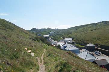 The view of the apartments as you come back down the coast path from the hotel (third roof from the right).