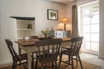 The dining-area has a door out to the tiny enclosed courtyard.