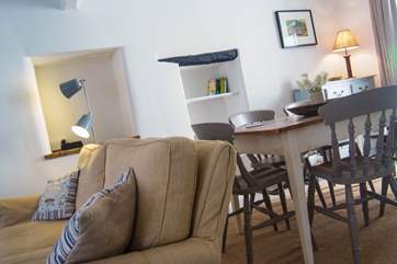 The dining-area is at the rear of the room.