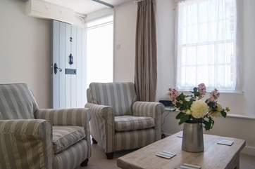 The front door opens into the lovely sitting-room.
