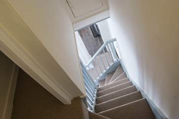 Looking downstairs from the landing outside Bedroom 1.