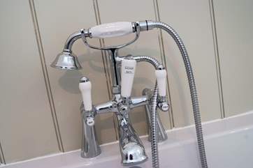 Useful hand shower for hosing down small children after a day at the beach!