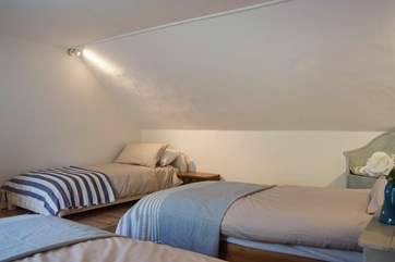 Bedroom 2 has two standard 3' twin beds plus a 2'6'' bed (recommended for children only).
