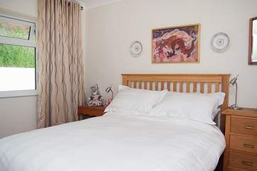 Bedroom 2 is a standard double and the trundle bed is stored underneath this bed.