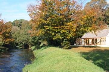 The River Lynher borders the garden