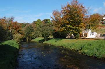 Look out for kingfishers darting over the water.