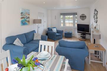 The spacious sitting/dining-room.