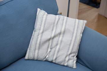 Soft cushions on the sofa.