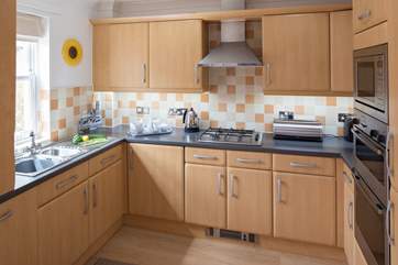 The well-equipped kitchen.