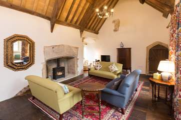 The Tudor Room is now your stunning living-room. The door in the corner is to the castle tower! The musuem staff will give you a tour if you wish.