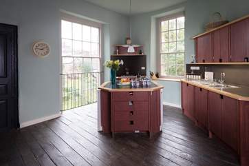 There is a stylish kitchen with views over the gardens of the Castle Hotel.