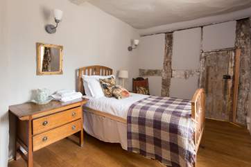 The single bedroom reallly celebrates the history of Castle House with its ancient exposed wall beams.
