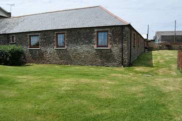The Old Byre basks in sunshine and has a really large enclosed garden.