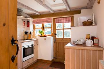 The kitchen leads out to the back garden