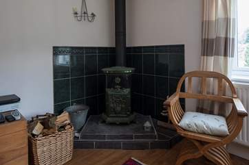 The French-style wood-burner throws out some delightful heat.