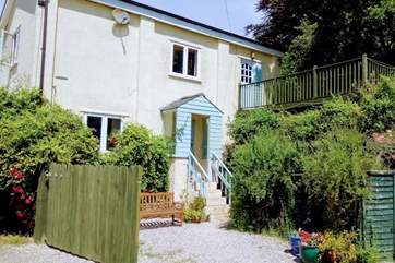 The front of this lovely property is approached by five steps.