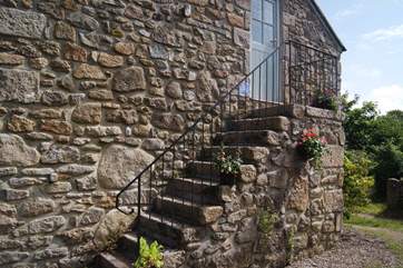 Steps lead up to the property.