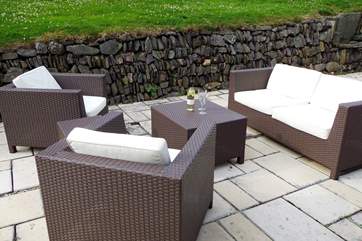 The patio has inviting seating, a table-tennis table and a stone barbecue area built into the wall at the edge of the garden. A disposable barbecue is kindly provided for you.