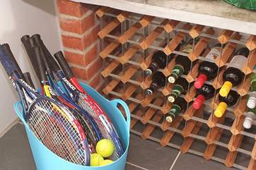Racquets and tennis balls are provided for you. Even the wine in the rack is for you to enjoy - with a simple request to replace what you use!
