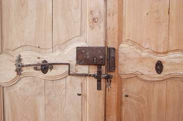 Antique doors are just one of the unique features in this stylish property.