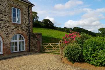 The cottage has a lovely terrace style garden at the front as well as a lawned garden and patio at the back.