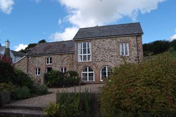 This is the setting for The Coach House, the whole of this attractive detached stone building.