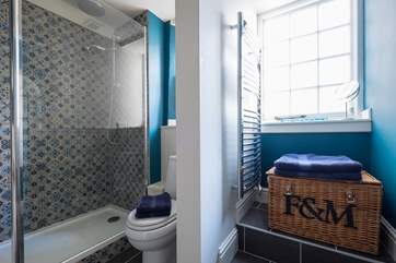 The shower-room is adjacent to the bedroom on the ground floor.