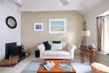 A wood-burner to warm the sitting-area.