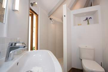 The bunk bedroom also has an en suite shower-room.