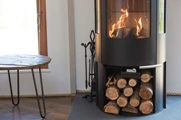 A cosy wood-burner suppliments the under-floor heating.