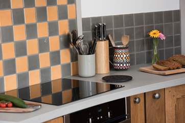 The kitchen is well-equipped, perfect for rustling up a scrumptious supper.