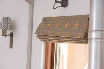 Gorgeous fabrics have been used for the furnishings.
