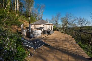 Buzzard is set into the woodland with a huge deck and fabulous views.