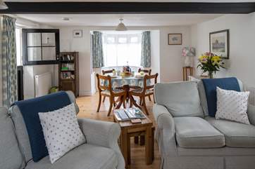There is a spacious sitting/dining-room with a useful porch for wellies and walking boots.