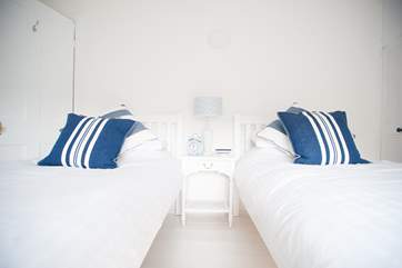 Bedroom 1 has twin beds.