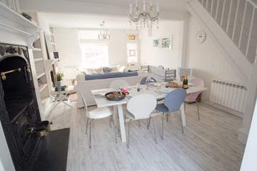 Looking from the kitchen towards the dining and sitting areas.