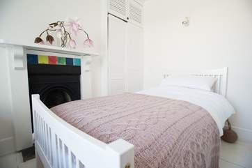Bedroom 2 also has an original cast iron fireplace.