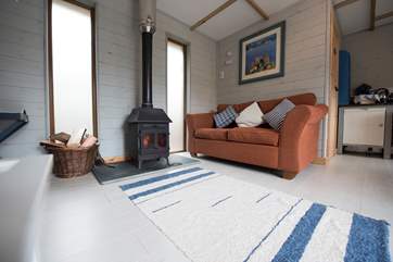 With a comfortable sofa next to the wood-burner keeping you toasty and warm during the cooler months.