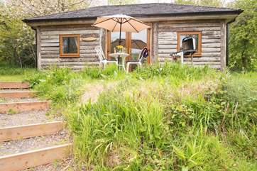 Ashley's Shack sitting proud in its spot overlooking the lake below.