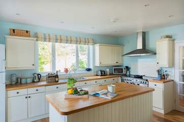 The spacious kitchen-area with large cooking range and the utility-room right next door, this leads through to the ground floor shower-room.