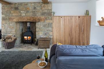 The TV can be clerverly hidden behind bespoke wooden doors.