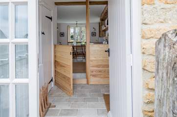 From the entrance hall, with the kitchen ahead and cloakroom to the left. Please mind the small step.