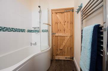 There is a fitted shower over the bath.