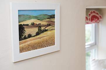 Original artwork throughout the cottage.