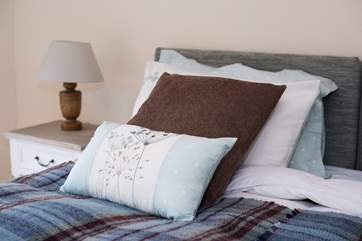 Lovely cushions and lamps in every bedroom.